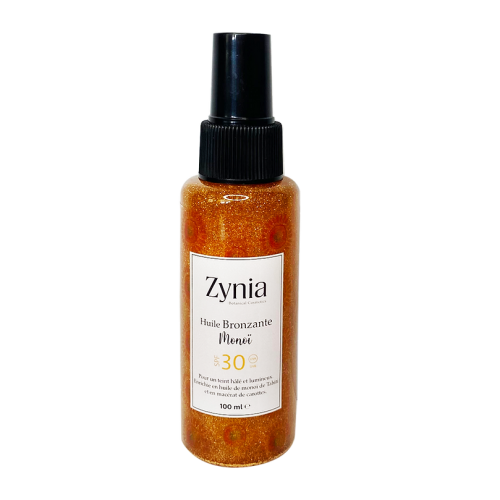 ZYNIA Huile Bronzante Monoi SPF 30 mélange des ingrédients 100% naturels pour révéler un bronzage sublime et un teint doré.